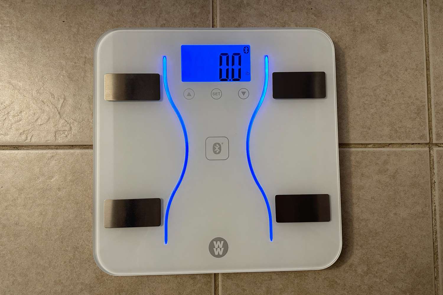 WW by Conair Bluetooth Body Analysis Bathroom Scale placed on floor and powered on 